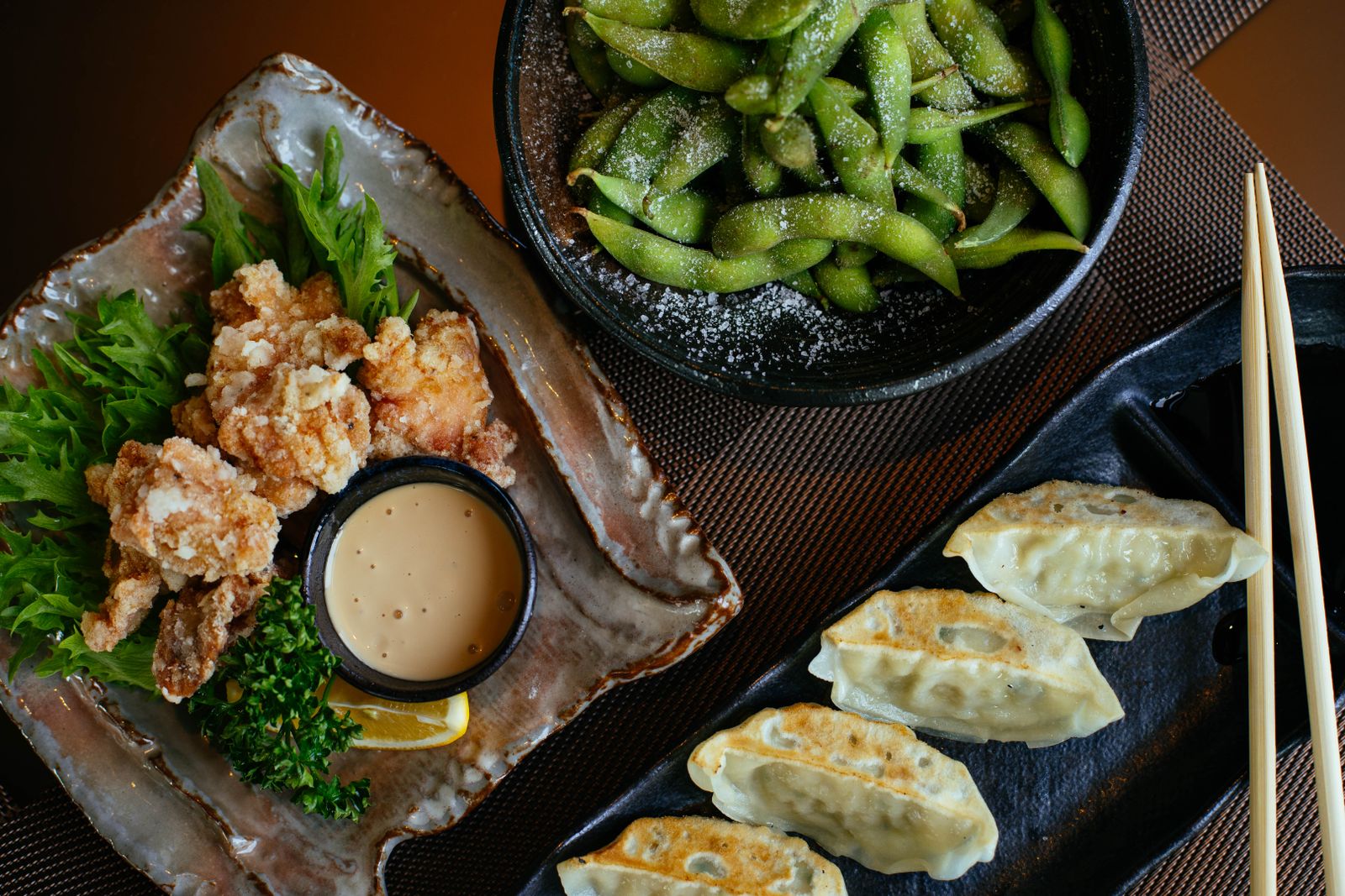 Tsumami: Counter snacks. Order two or three before the noodles hit the water.