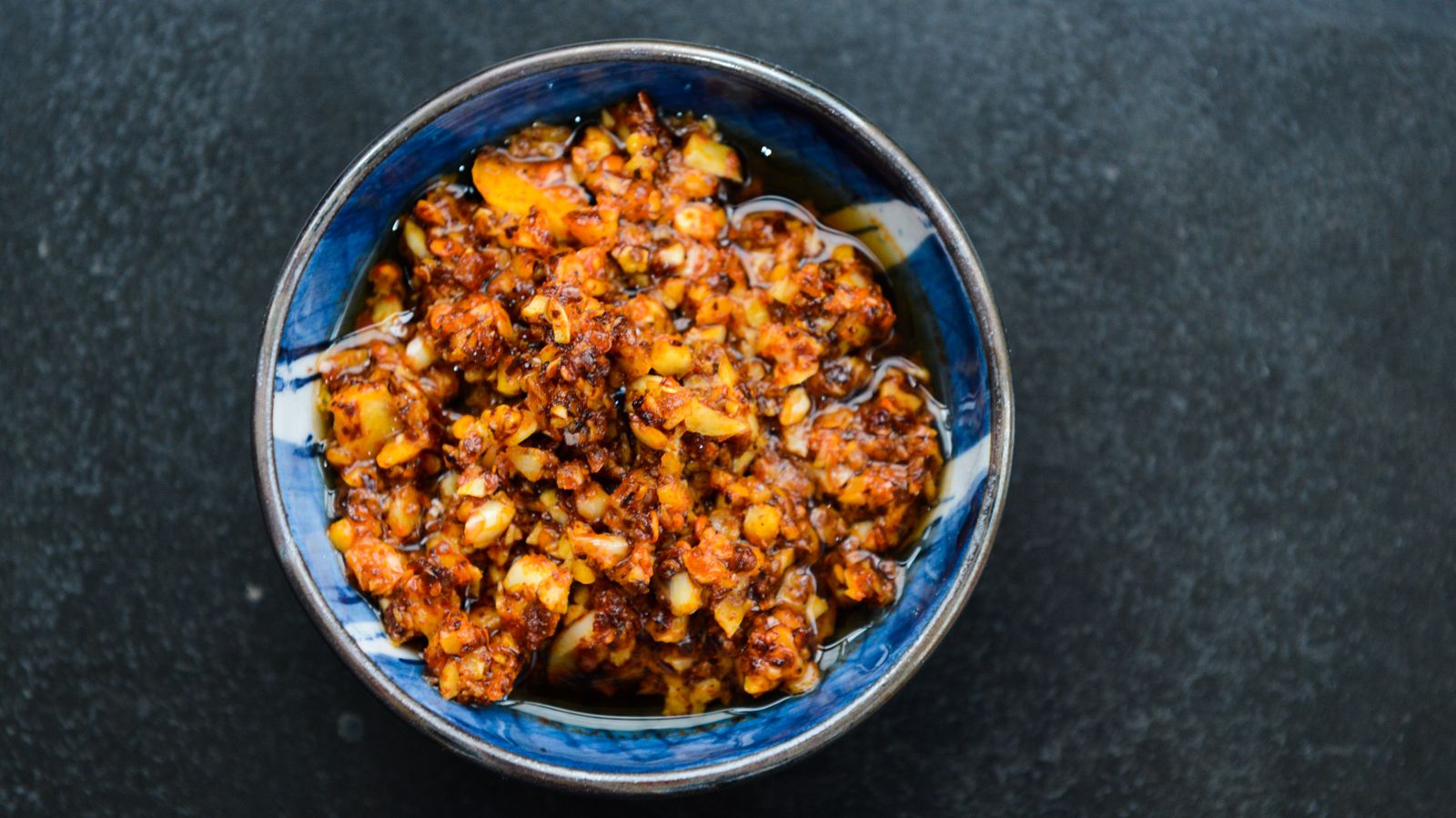 Chili oil bloomed with Hawaiian chili, Sichuan pepper, garlic and sesame